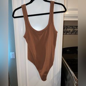 Nikibiki brown one size bodysuit.